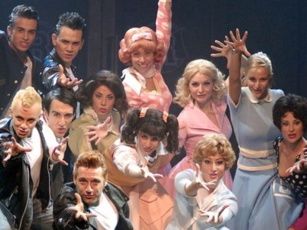 Una scena di «Grease», stasera e domani al Palabrescia di via San Zeno 